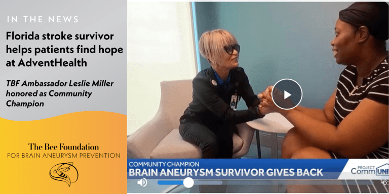 A smiling woman in scrubs holds hands with another woman wearing a headband, both seated and facing each other. The screen reads Brain aneurysm survivor gives back and highlights a story about a stroke survivor at AdventHealth.