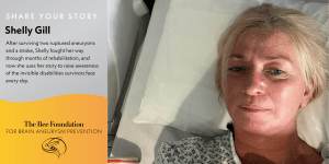 A woman with light hair lies in a hospital bed, wearing a hospital gown, looking at the camera. Beside her, text shares her story as a brain aneurysm survivor and mentions The Bee Foundation for Brain Aneurysm Prevention.