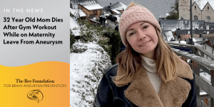 A young woman in a winter hat and brown jacket smiles outdoors in a snowy village. The image includes text about a 32-year-old mom who died from an aneurysm after a gym workout while on maternity leave, with The Bee Foundation logo.